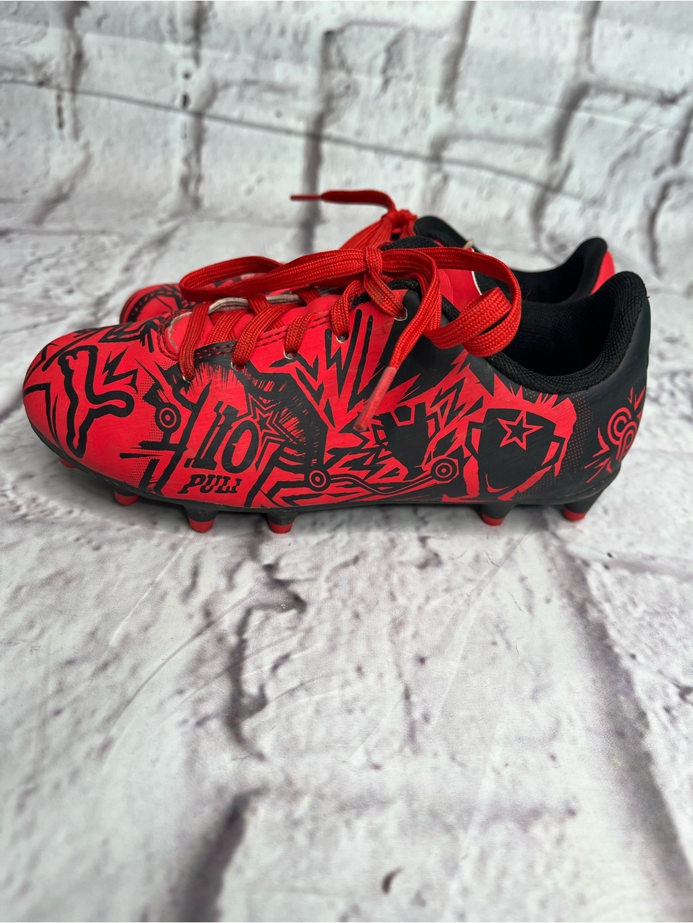 PUMA x Christian Pulisic Tacto II Kids' Firm/Artificial Ground Soccer Cleats 13